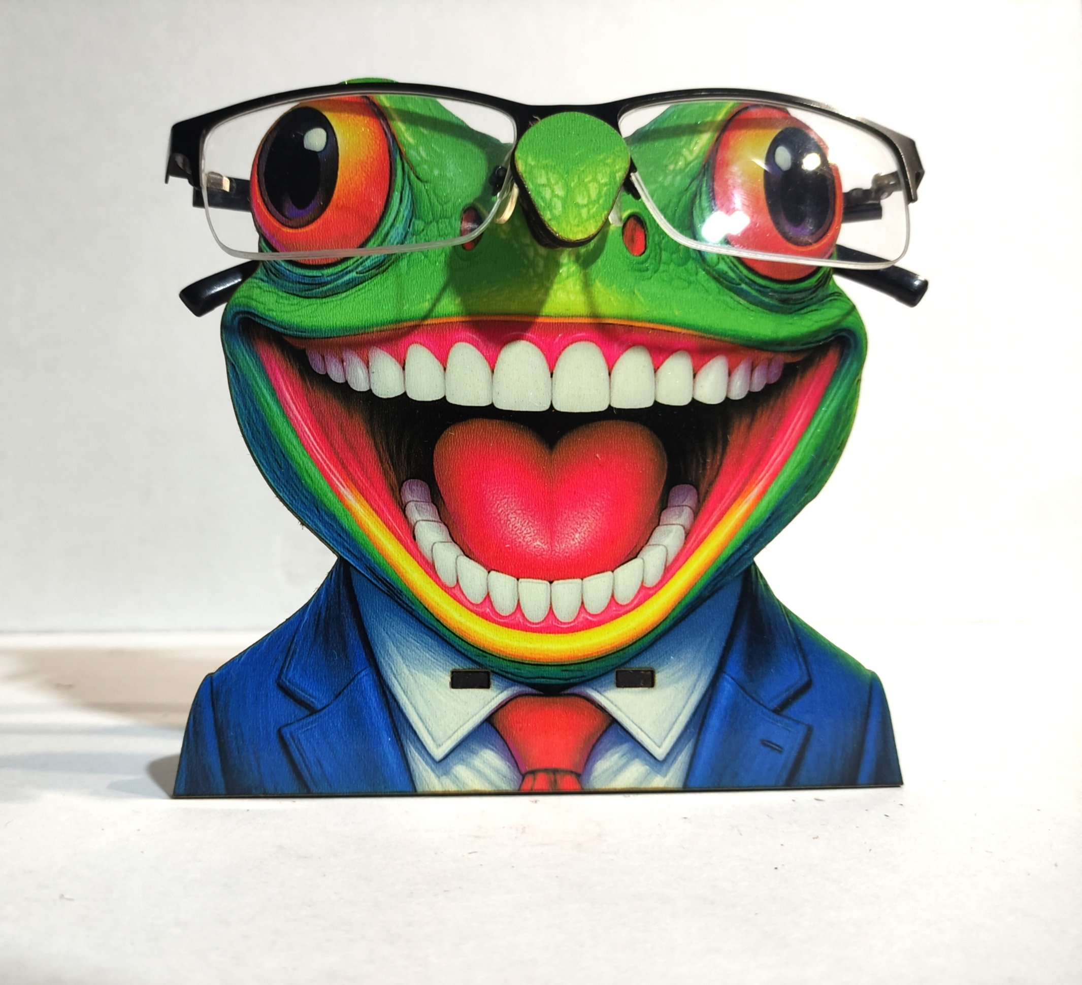 support lunettes grenouille